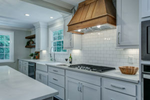 Cabinetry: French's Cabinet Gallery / Countertops: Frosty Carrina quartz